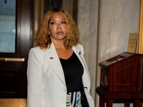 U.S. Rep. Lucy McBath (D-Marietta) cheered female members of Congress at a recent softball game against journalists. (Nathan Posner for The Atlanta Journal-Constitution)