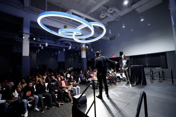 The Gathering Spot co-founders Ryan Wilson and TK Petersen speak to members during a Town Hall meeting where they announce future plans and the recent separation from their parent company, Greenwood, on Monday, Dec. 18, 2023.
Miguel Martinez /miguel.martinezjimenez@ajc.com