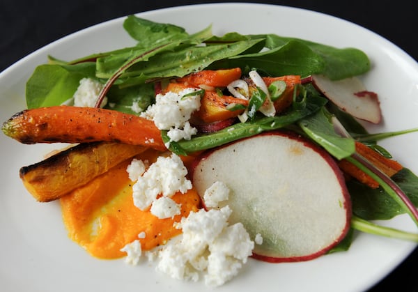  Roasted Carrot & Carrot Puree, pac choi & kale, pear, pomegranate seeds, green onion, cilantro, coriander seed vinaigrette. (BECKY STEIN/special)