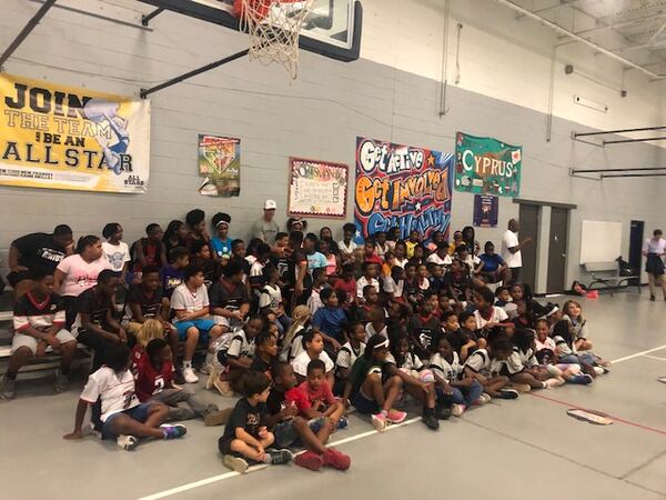 Falcons quarterback Matt Ryan with the students at the Samuel Jones Boys and Girls Club of Metro Atlanta on Thursday. (By D. Orlando Ledbetter/Dledbetter@ajc.com)