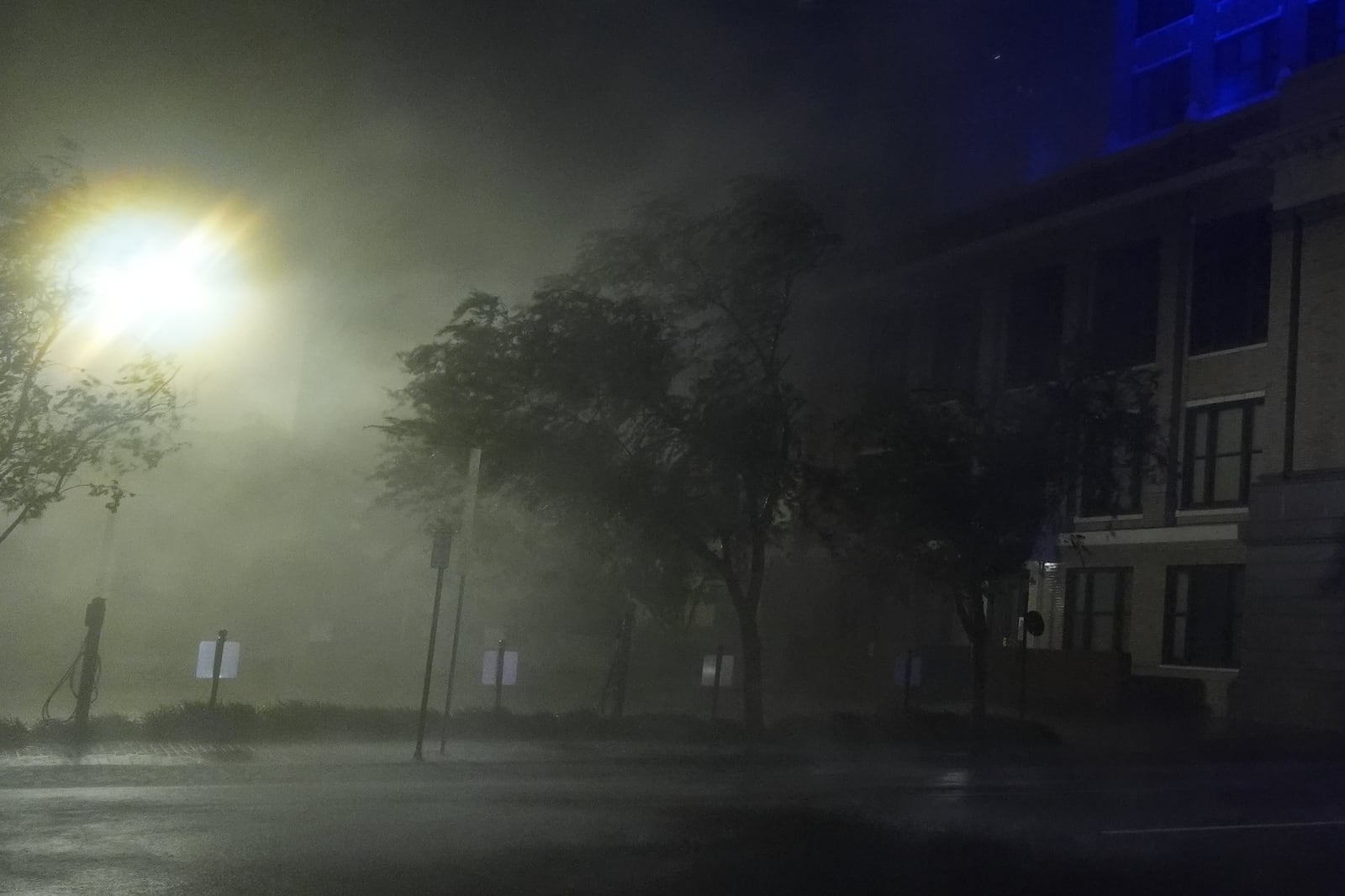 Wind-driven rain soaks a street in downtown Tampa, Fla., during the passage of Hurricane Milton, Wednesday, Oct. 9, 2024. (AP Photo/Rebecca Blackwell)