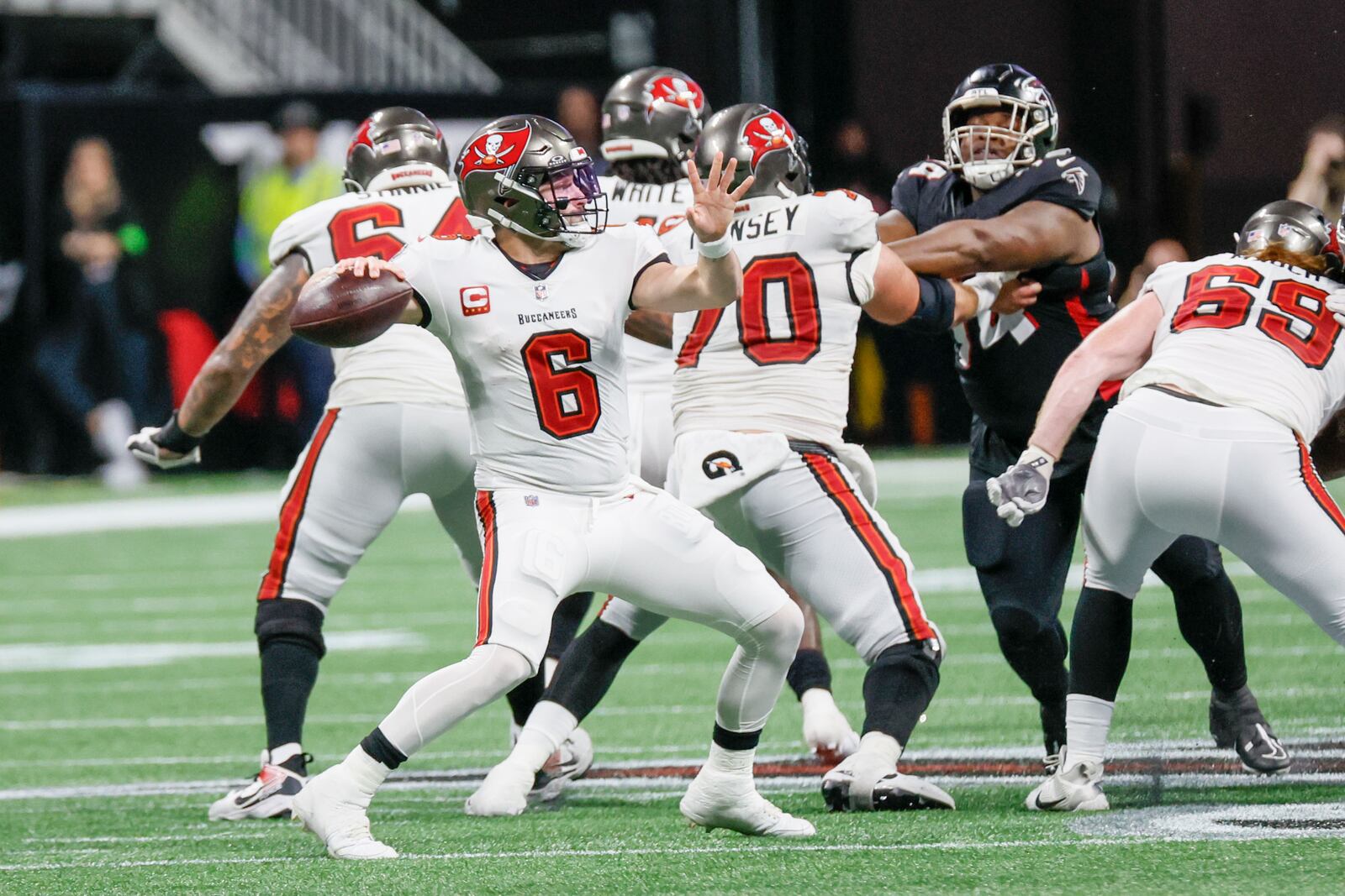 Tampa Bay Buccaneers quarterback Baker Mayfield (6) prepares a pass during the second half of an NFL football game against the Atlanta Falcons on Sunday, Dec. 10, 2023, at Mercedes-Benz Stadium in Atlanta. 
Miguel Martinez/miguel.martinezjimenez@ajc.com