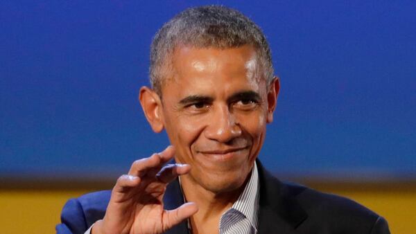 United States former President Barack Obama salutes after giving his speech at the "Seeds&Chips - Global Food Innovation" summit, in Milan, Italy, Tuesday, May 9, 2017. Obama delivered a keynote speech on food security and the environment, two issues that he has long worked on. (AP Photo/Luca Bruno)