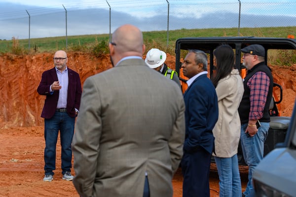 Archer Aviation's VP of manufacturing, Glen Burks, shows where the taxiway will connect the Covington Municipal Airport to Archer Aviation's new eVTOL production facility in Oxford, Georgia, November 16, 2023. (Jamie Spaar for the Atlanta Journal Constitution)