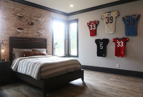 Devon Gales' new bedroom at the family home in Jefferson. Do you sense a theme? (Christina Matacotta/Christina.Matacotta@ajc.com)