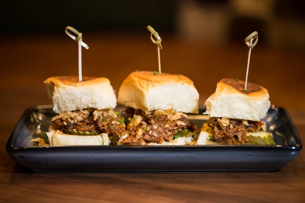  Pulled Pork Sliders with crispy onions, pickles, and King's Hawaiian rolls. Photo credit- Mia Yakel.