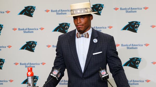 Cam Newton addresses the media after Carolina's win over  the San Francisco 49ers in Charlotte, N.C.