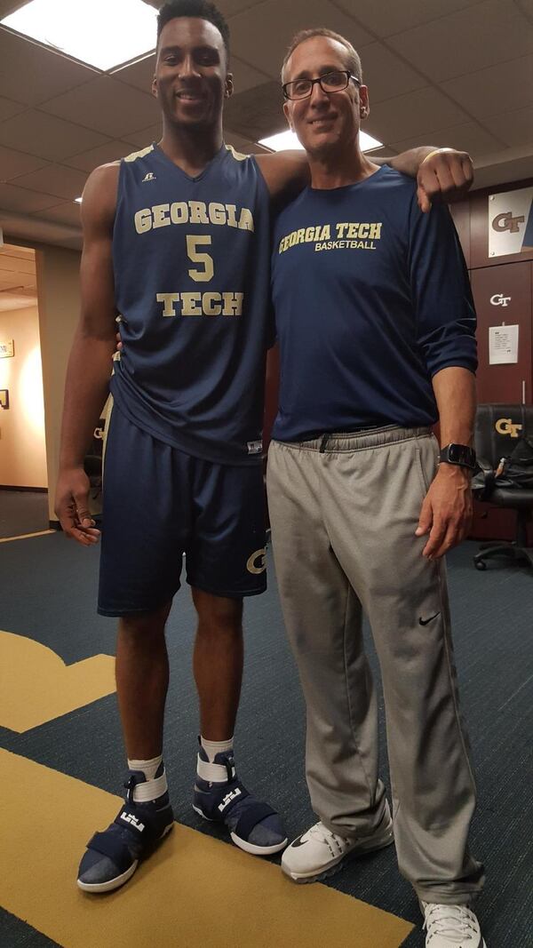 Ron Bell poses with Georgia Tech basketball player Josh Okogie in the team’s locker room in 2017. Among other mischaracterizations to NCAA investigators, Tech coach Ron Pastner said he never allowed Bell, his estranged friend and a former prison inmate, into the locker room. 