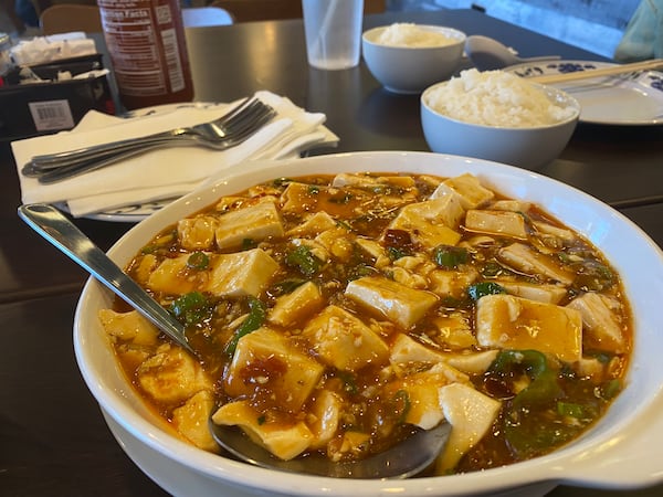 Silky, soft and spicy, the mapo tofu at Bun Factory is a don't-miss dish. Ligaya Figueras/ligaya.figueras@ajc.com