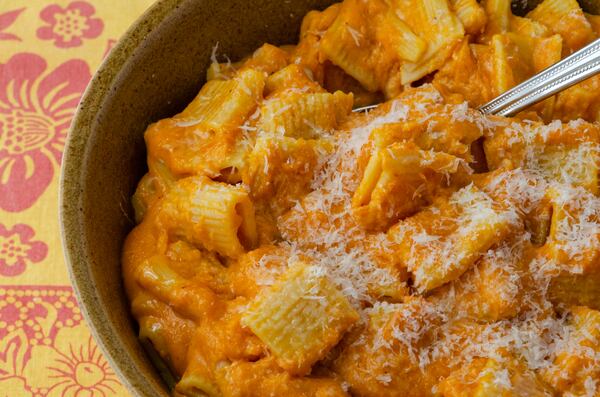 Cheesy pumpkin sauce coats penne noodles in this creamy, rich pasta dish. (Styling by Lori Horne / Virginia Willis for the AJC)