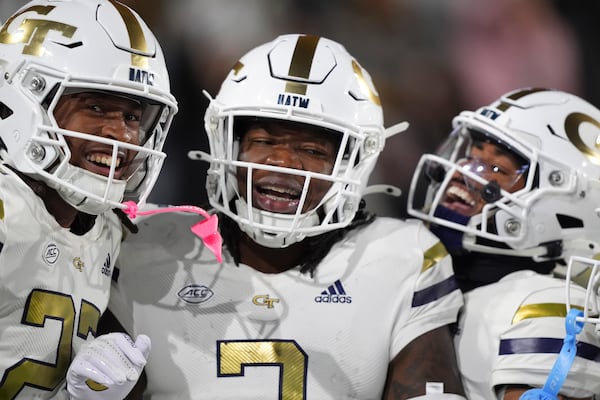 Georgia Tech linebacker E.J. Lightsey (2) celebrates a touchdown after an interception during the first half of an NCAA college football game against North Carolina State, Thursday, Nov. 21, 2024, in Atlanta. (AP Photo/Brynn Anderson)