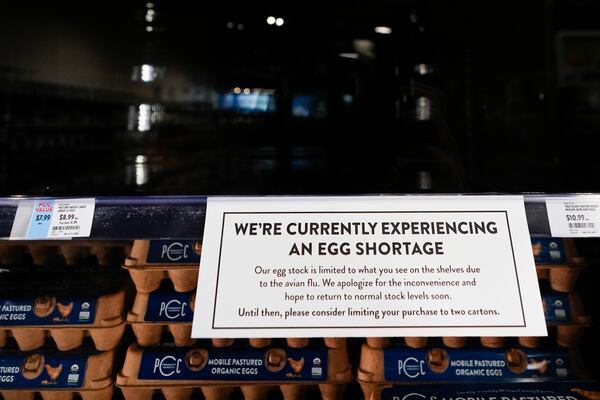 A sign asks customers to consider limiting their purchases of eggs at a PCC Community Markets grocery store due to shortages caused by avian flu, Monday, Jan. 27, 2025, in Seattle. (AP Photo/Lindsey Wasson)