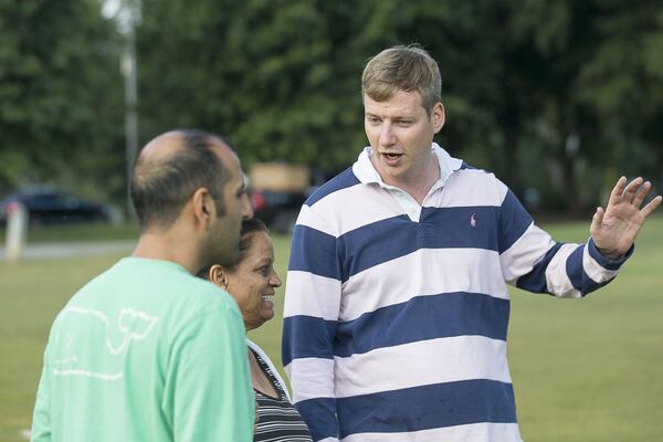 Atlanta Balloon Glow event director Ricky Garvie (right) speaks about the event with Rekha Sareen (center) and Vishal Sareen (left) at Piedmont Park in Atlanta, Thursday, August 1, 2019. The Atlanta Balloon Glow event, which is said to feature more than 10 tethered hot air balloons for rides, is set for August 1 through August 4. ALYSSA POINTER / ALYSSA.POINTER@AJC.COM