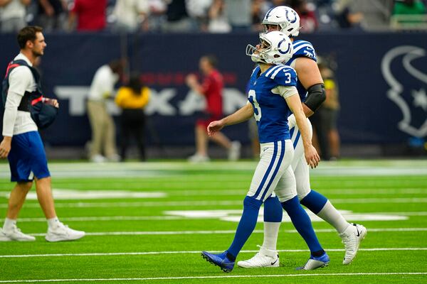 Indianapolis Colts place kicker Rodrigo Blankenship (3) walks off the field after missing a field goal in overtime of an NFL football game Sunday, Sept. 11, 2022, in Houston. (AP Photo/David J. Phillip)