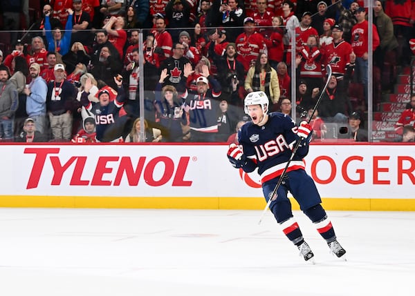 Jake Guentzel of Team USA celebrates an empty net goal against Canada.