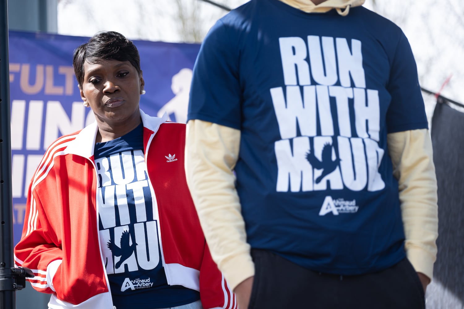 Wanda Cooper-Jones listens to speakers before the start of the 2.23 mile Ahmaud Arbery Day Run in Atlanta on Sunday, Feb. 23, 2025, to mark the anniversary of the day her son was killed while out on a run near Brunswick.   Ben Gray for the Atlanta Journal-Constitution