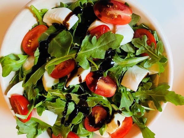 Mercato Caprese salad with fresh mozzarella, wild baby arugula, tomatoes and balsamic reduction.
Courtesy of Bob Townsend