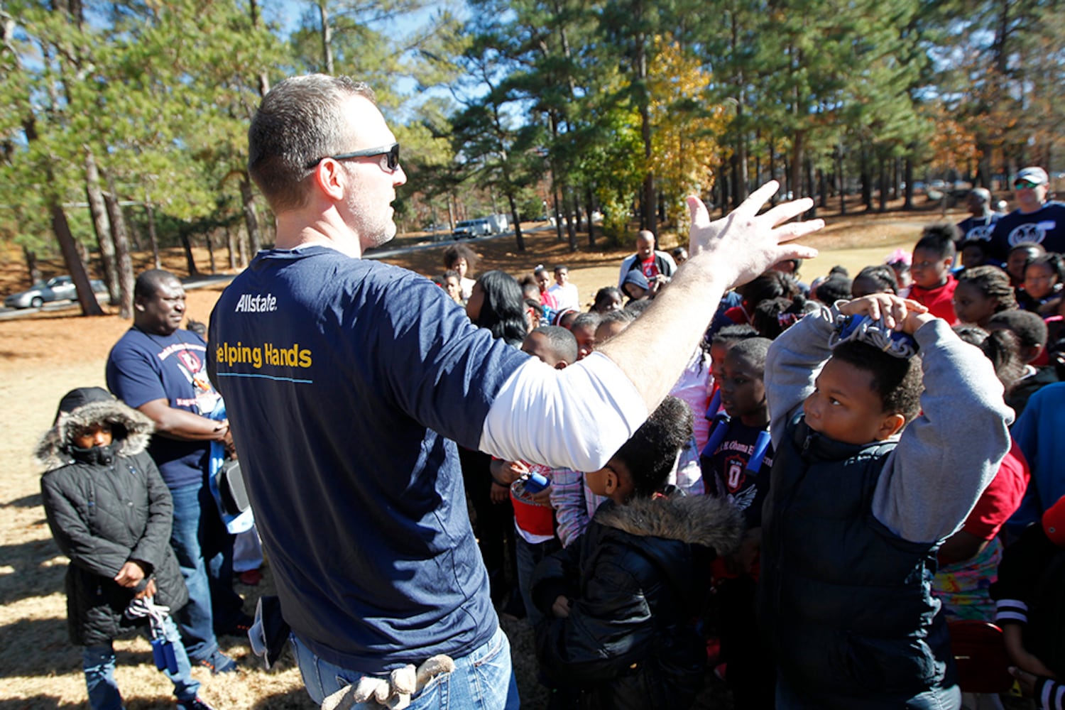 SEC stars build football field in DeKalb