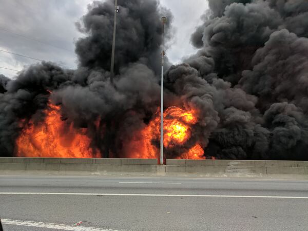 Heavy smoke and fire could be seen from the interstate Thursday.  (Credit: Jackson Klinefelter)