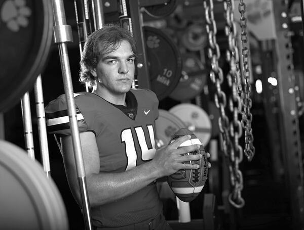 Rabun County’s highly rated quarterback Gunner Stockton points to one thing that motivates him to push through any challenges on and off the field. “My family, they’ve always been there for me, and don’t want to let them down and do my best,” said Stockton, who is in the 2021 Class of the AJC’s Super 11. (Tyson Alan Horne / Tyson.Horne@ajc.com)
