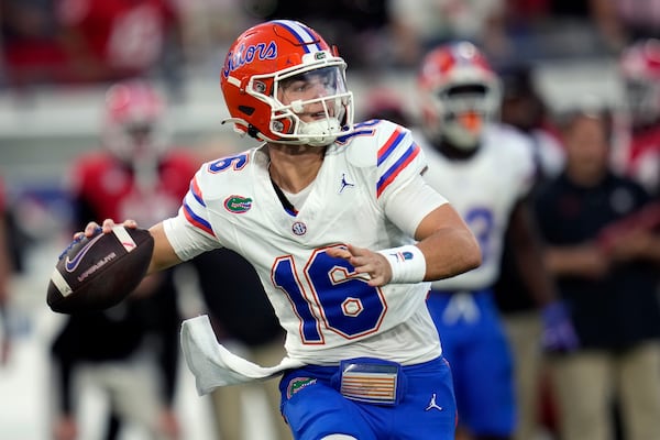 Florida quarterback Aidan Warner throws a pass during the second half of an NCAA college football game against Georgia, Saturday, Nov. 2, 2024, in Jacksonville, Fla. (AP Photo/John Raoux)