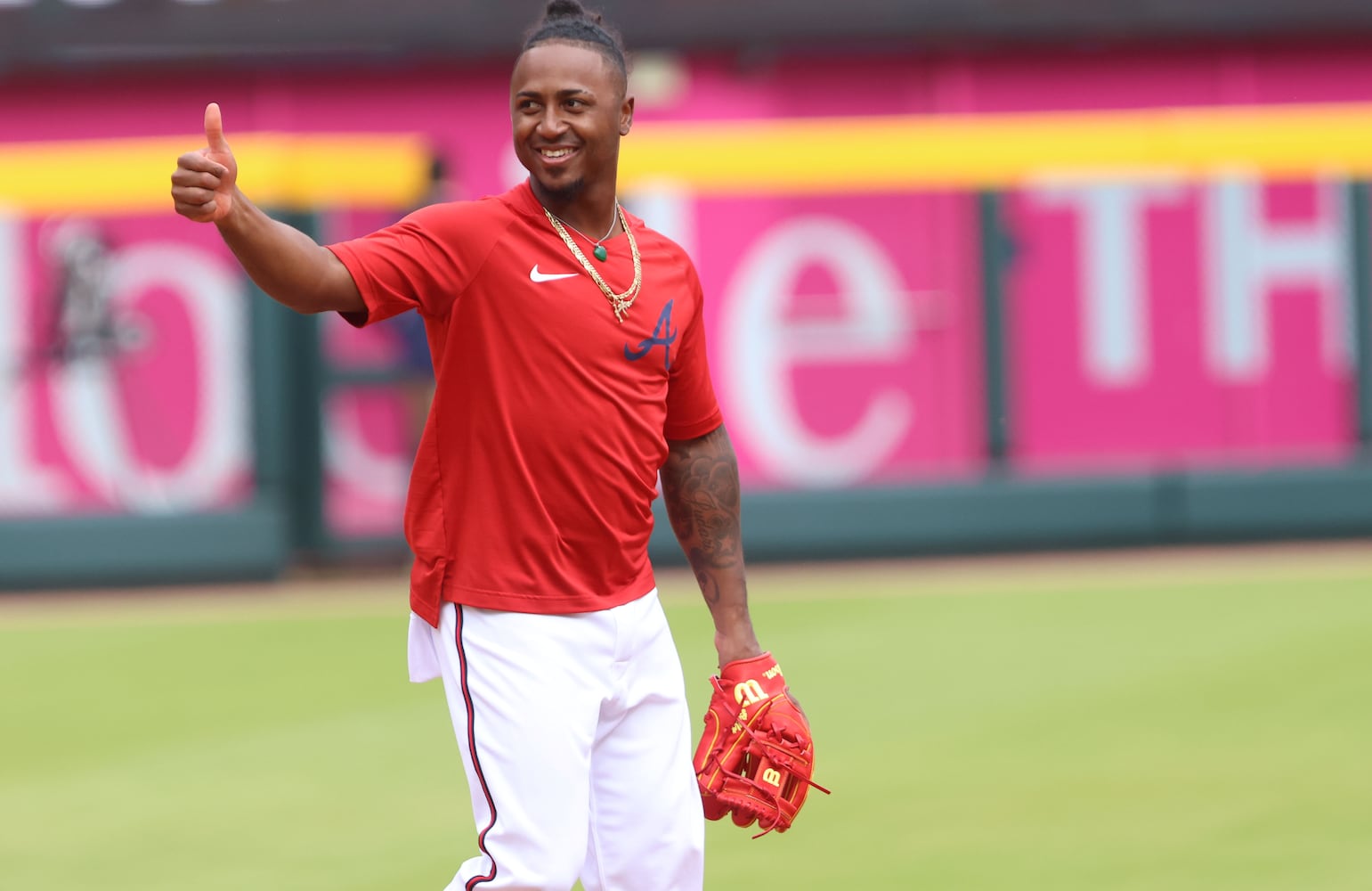 Braves second baseman Ozzie Albies gives a thumbs-up during warmups Monday at Truist Park. (Miguel Martinez/miguel.martinezjimenez@ajc.com)