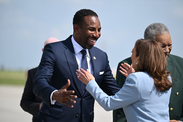 Vice President Kamala Harris greets Atlanta Mayor Andre Dickens as she arrives for a rally at the Georgia State University’s convocation center in Atlanta on Tuesday, July 30, 2024. It is her first campaign event in Georgia since she became the presumptive Democratic nominee.  (Hyosub Shin / Hyosub.Shin / ajc.com)