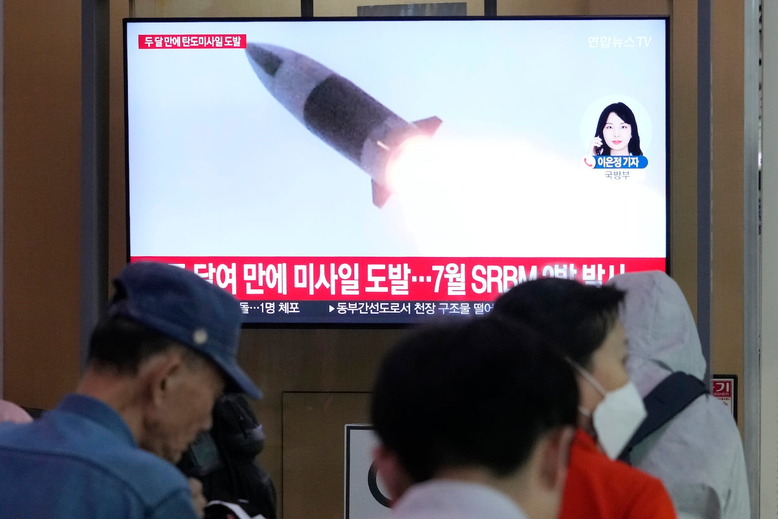 A TV screen shows a file image of North Korea's missile launch during a news program at Seoul Railway Station in Seoul, South Korea, Thursday, Sept. 12, 2024. (AP Photo/Ahn Young-joon)