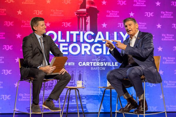 AJC reporter Greg Bluestein interviews U.S. Sen Joe Manchin, D-West Virginia, for an AJC Town Hall at Georgia State University in Atlanta on Friday, January 26, 2024. (Arvin Temkar/arvin.temkar@ajc.com)