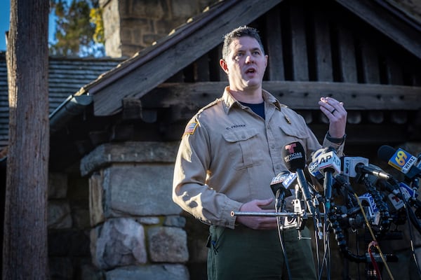 Assistant Division Fire Warden Chris Franek speaks to reporters during a briefing at the New Jersey Forest Fire Service Command Post, Monday, Nov. 11, 2024, in Ringwood, N.J. (AP Photo/Stefan Jeremiah)