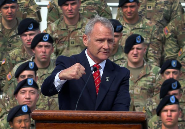 Retired Col. David M. Moore, the son of  Lt. Gen. Hal and Julia Moore, speaks Thursday morning during a ceremony at Doughboy Stadium where Fort Benning was redesignated as Fort Moore. (Photo Courtesy of Mike Haskey/The Ledger-Enquirer)