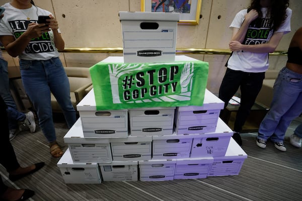 Sixteen boxes with over 100,000 signatures await inside the City Hall Clerk’s office, ready to be processed and accepted; opponents of Atlanta’s planned public safety training center presented their petition to have the matter of the training center included on the ballot for general consideration.

Miguel Martinez /miguel.martinezjimenez@ajc.com