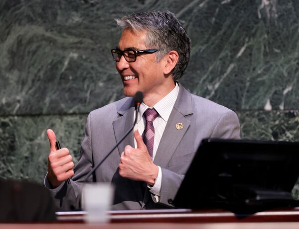 Council member Alex Wan reacts as he presents a committee report as the Atlanta City Council held their first in person meeting since they were suspended at start of the pandemic In Atlanta on Monday, March 21, 2022.   (Bob Andres / robert.andres@ajc.com)