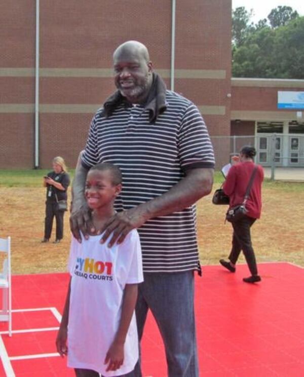 Shaquille O’Neal poses for a photo with Lamar Brockington at the event. (Photo Courtesy of Anthony Rhoads)