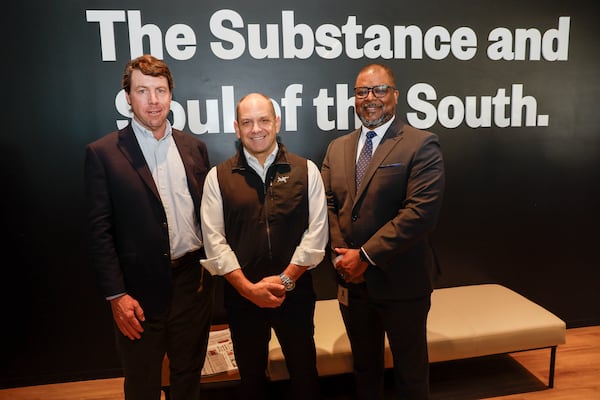 Cox Enterprises CEO Alex Taylor, AJC Publisher Andrew Morse and AJC Editor in Chief Lery Chapman poses for a photograph after the ribbon-cutting ceremony at the Atlanta Journal-Constitution in Midtown on Friday, January 24, 2025.
(Miguel Martinez/ AJC)