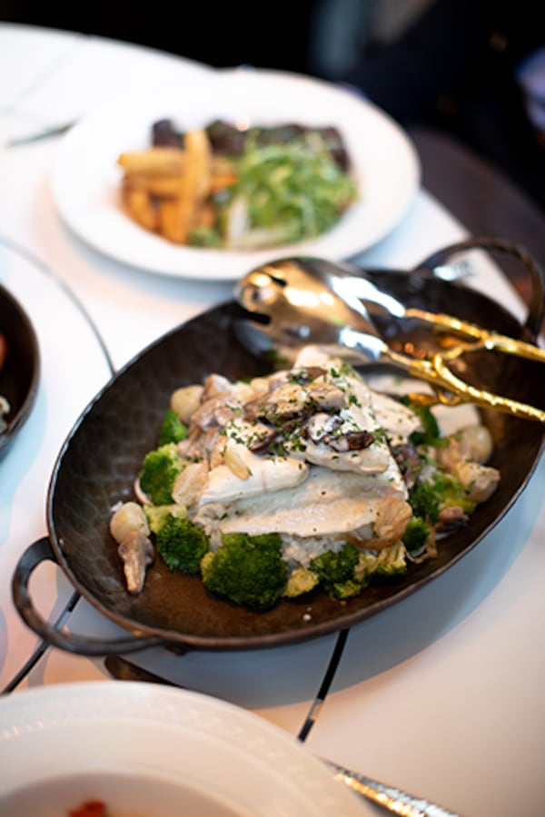 The Dover sole entree for two ($110) is luxurious, but the sides are rather basic: rice pilaf and steamed broccoli. Courtesy of Waldorf Astoria Atlanta Buckhead