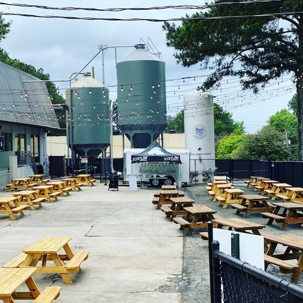 Scofflaw recently reopened its taproom and created a new outdoor space with picnic tables. CONTRIBUTED BY SCOFFLAW BREWING CO.