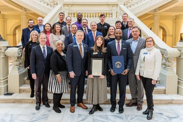 Members of the Georgia General Assembly joined a number of aerospace leaders at the Georgia State Capitol, including Rod McLean (third from right, front row), site general manager of Lockheed Martin’s Marietta facility on Tuesday. (Photo Courtesy of Thinh D. Nguyen)