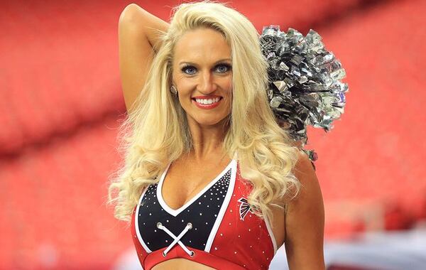 Cayla loves cheering on the Falcons from the best seats at the Georgia Dome. (Curtis Compton/Ccompton!ajc.com)