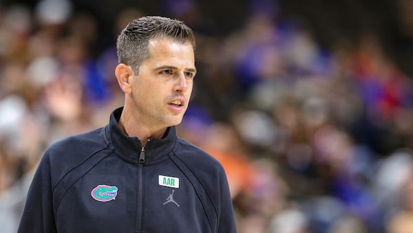 Florida head coach Todd Golden watches play during the first half of an NCAA college basketball game against South Florida, Monday, Nov. 4, 2024, in Jacksonville, Fla. (AP Photo/Gary McCullough)