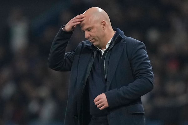 Liverpool's manager Arne Slot reacts during the Champions League round of 16 first leg soccer match between Paris Saint-Germain and Liverpool at the Parc des Princes in Paris, Wednesday, March 5, 2025. (AP Photo/Aurelien Morissard)