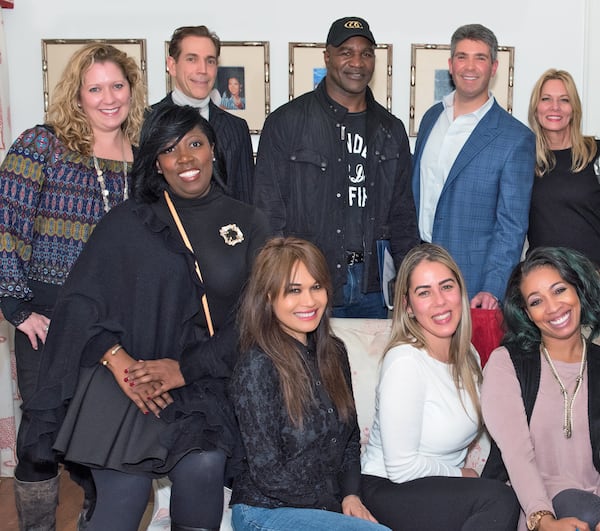 Back row, from left: Nancy Keenan, Dr. Louis Prevosti, Evander Holyfield, Ted Blum and Lisa Senters-McDermott. Front row, from left: Andra Hall, Maryan Aiken, Raquel Souza and Nyssa Green. Photo: Bubba Carr