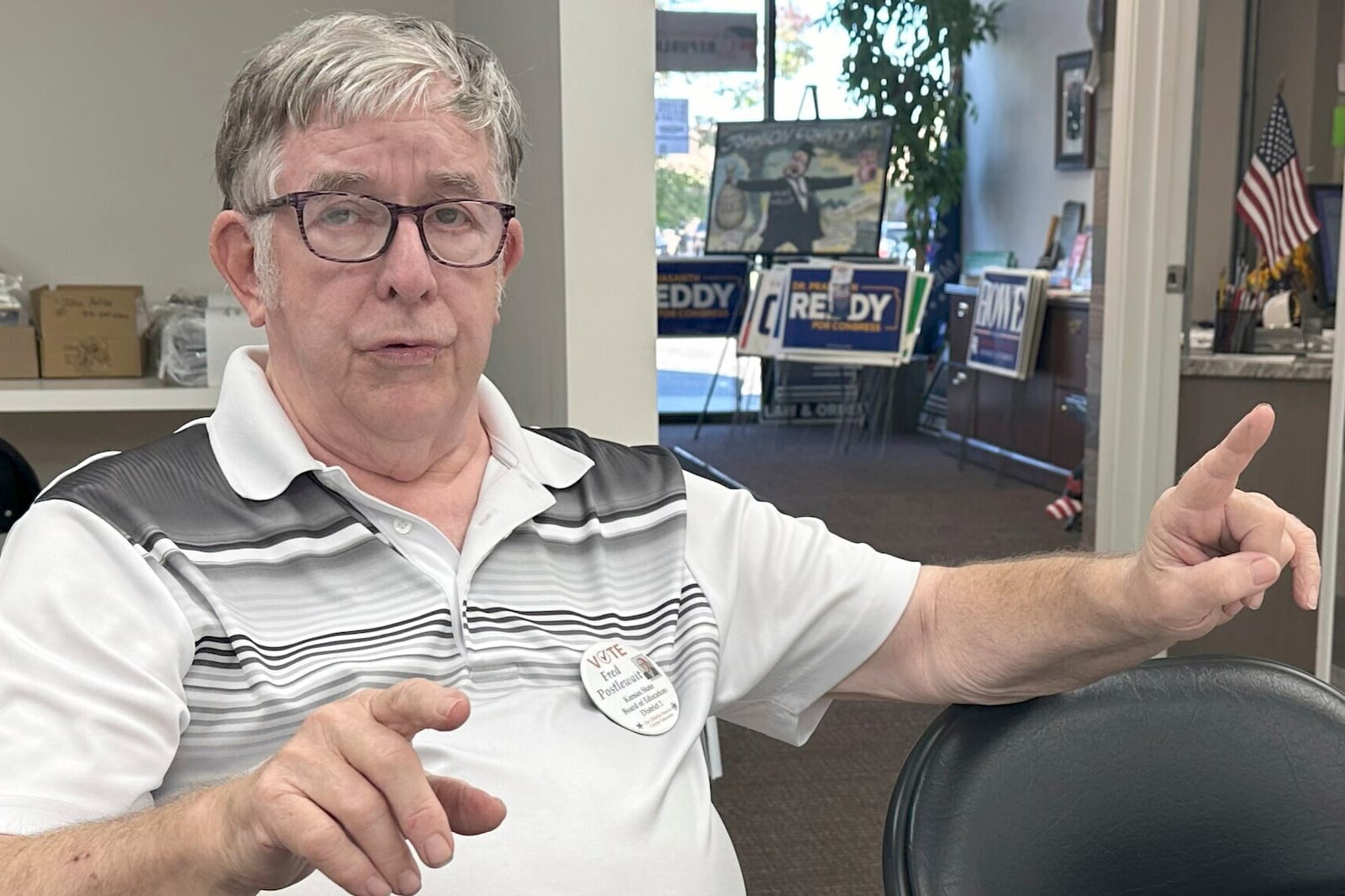 Kansas State Board of Education candidate Fred Postlewait, R-Kansas City, talks about his views on improving public schools during an interview at the Johnson County Republican Party's headquarters, Tuesday, Oct. 1, 2024, in Overland Park, Kan. (AP Photo/John Hanna)