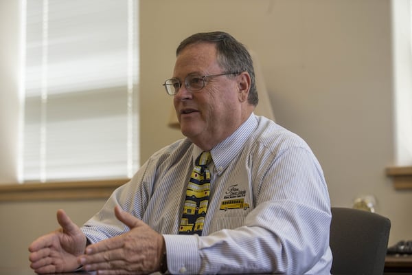 Sam Ham, executive director of the Fulton County Schools transportation department, speaks about the decision to switch some of his school buses from diesel fuel to propane gas. ALYSSA POINTER/ALYSSA.POINTER@AJC.COM