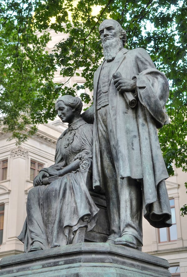 A statue of former Georgia Gov. Joseph Brown and his wife, Elizabeth, stands just outside the State Capitol. Brown was governor during the Civil War when the Constitution of 1861 was drafted. In a recent decision, the Georgia Supreme Court went back to that Confederate-era document to determine the original intent of court’s authority to review the constitutionality of state laws. (CHRIS HUNT / SPECIAL)