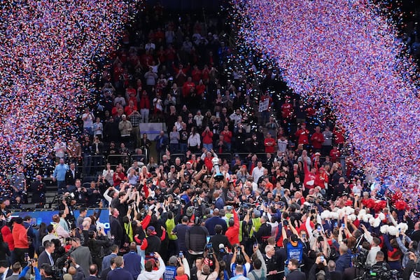 St. John's Zuby Ejiofor holds celebrates with teammates while holding the tournament trophy after an NCAA college basketball game against Creighton in the championship of the Big East Conference tournament Saturday, March 15, 2025, in New York. (AP Photo/Frank Franklin II)