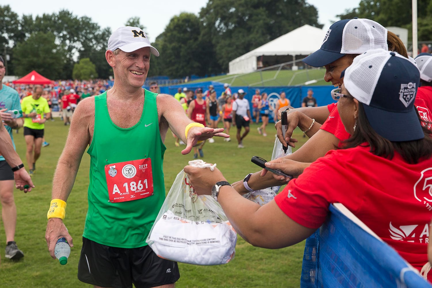 PHOTOS: Scenes at 2019 AJC Peachtree Road Race