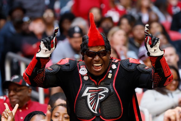 A Falcons fan reacts after his team scored a field goal in the last seconds of the game to beat Houston Texans 21-19  during the second half on Sunday, October 8, 2023, at Mercedes-Benz Stadium in Atlanta. 
Miguel Martinz/miguel.martinezjimenez@ajc.com