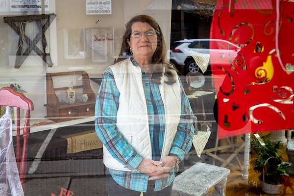 Kathleen Unkefer, a floral designer at Flowers Straight From the Heart, poses for a portrait at the store in East Palestine, Ohio, on Friday, February 17, 2023. (Arvin Temkar / arvin.temkar@ajc.com)