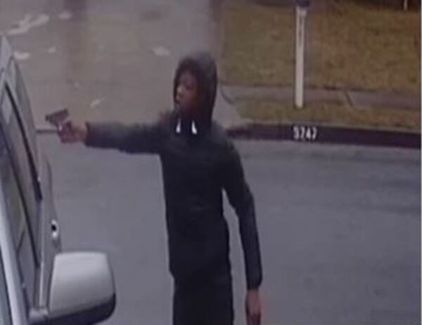 Surveillance video shows a teenager aiming a gun at a Clayton County family during an attempted carjacking  last week.